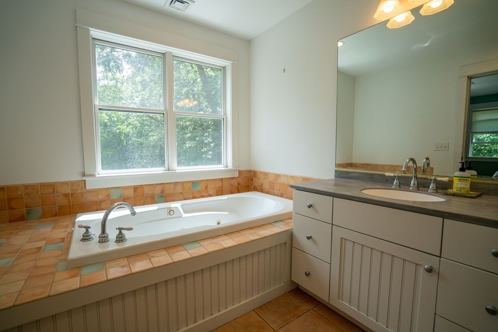 16 Long Hill Road Leverett, MA 01054 - Photo 24 of 38 a bathroom with a sink and a bathtub
