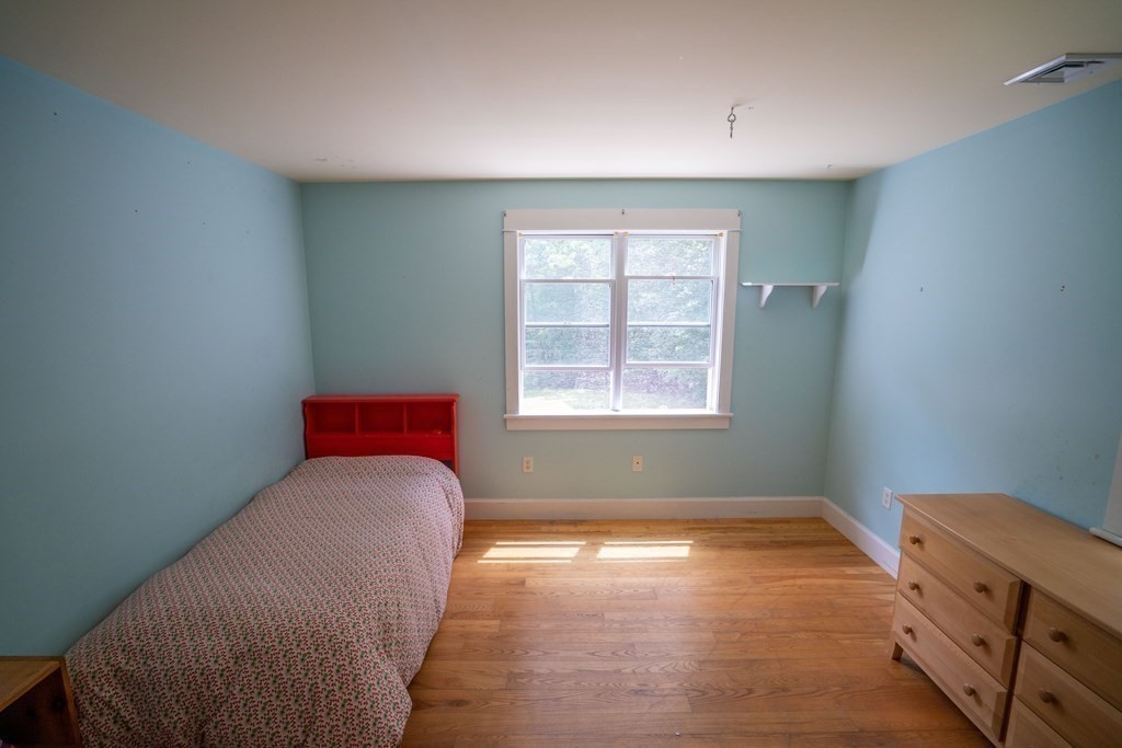 16 Long Hill Road Leverett, MA 01054 - Photo 28 of 38 a bedroom with a bed and a window