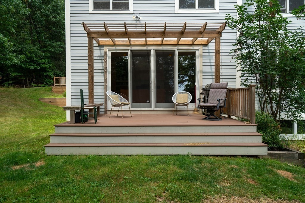 16 Long Hill Road Leverett, MA 01054 - Photo 3 of 38 a view of a house with backyard sitting area and garden