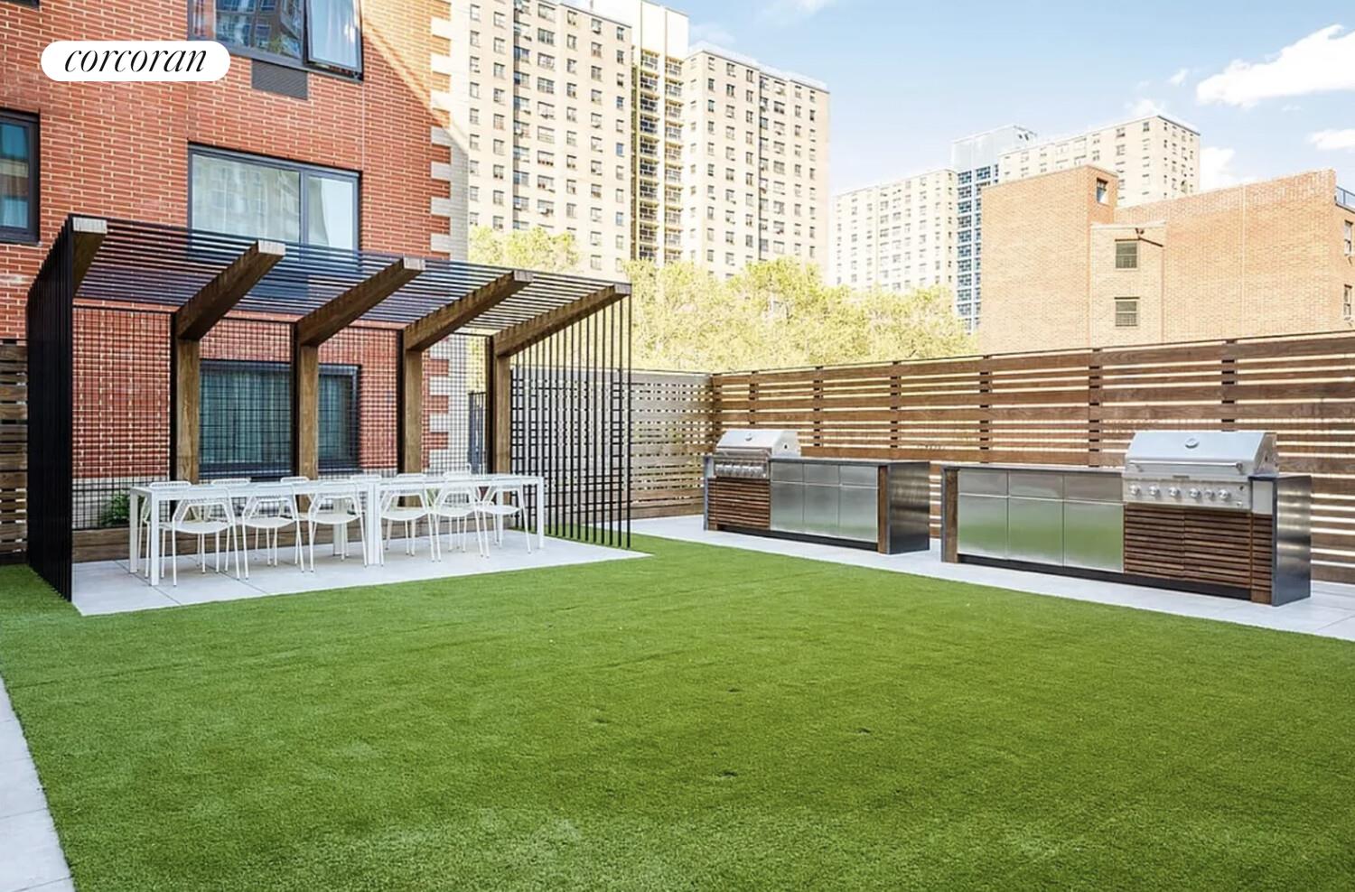 1330 5th Avenue, Unit 3H Manhattan, NY 10026 - Photo 6 of 12 a view of a house with a yard and sitting area