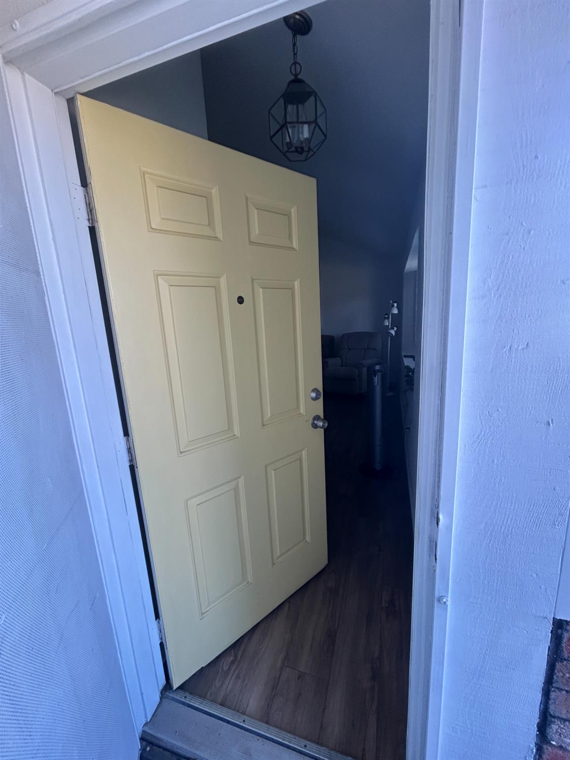4529 Fallbrook Place Salida, CA 95368 - Photo 3 of 26 a view of a hallway with wooden floor
