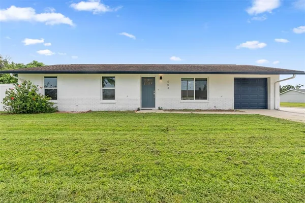 a house view with a garden space