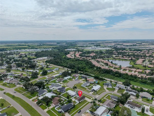 an aerial view of a city with lots of residential buildings