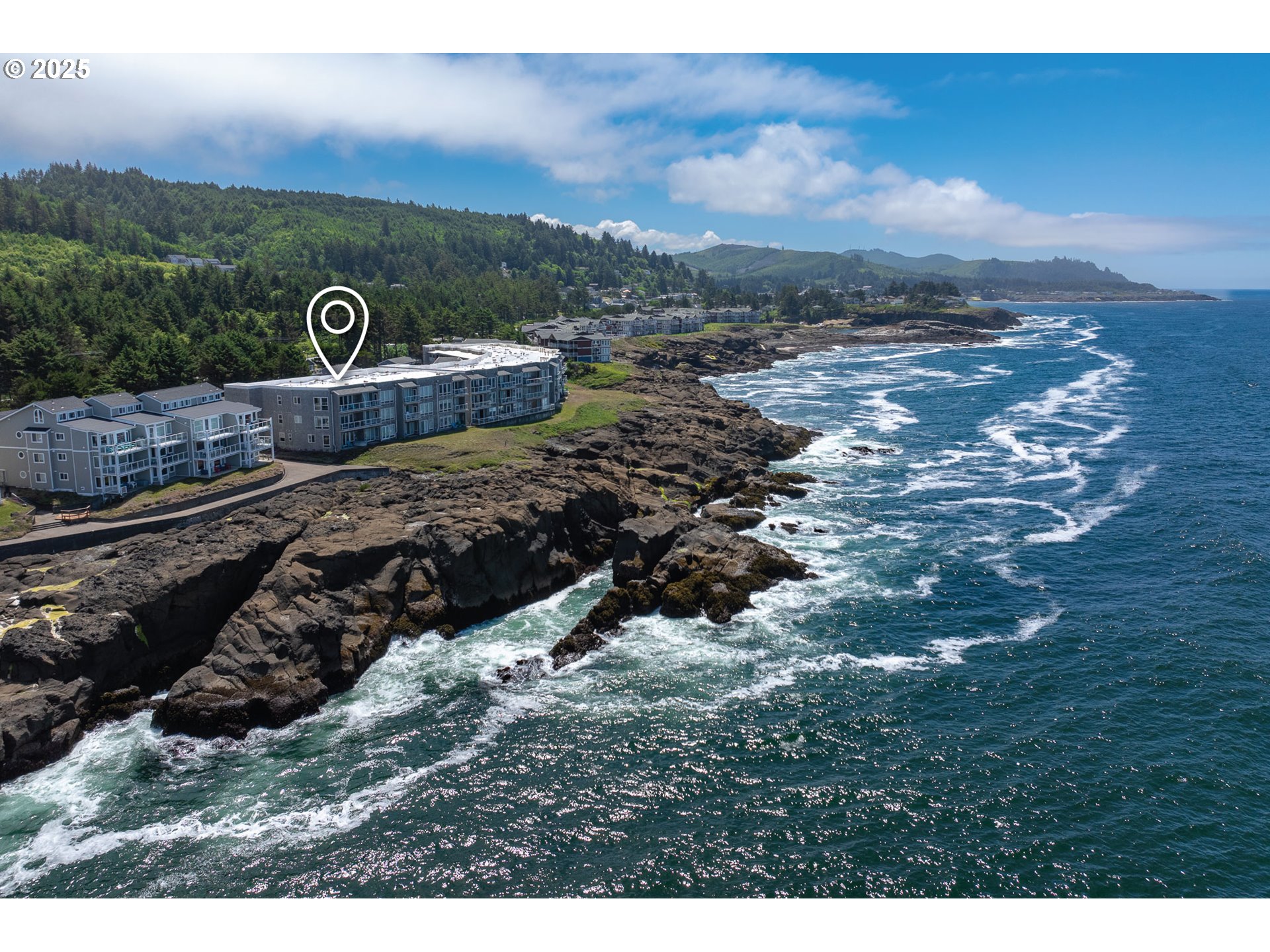 1113 Highway 101, Unit 52 Depoe Bay, OR 97341 - Photo 5 of 47 a view of a terrace with a garden