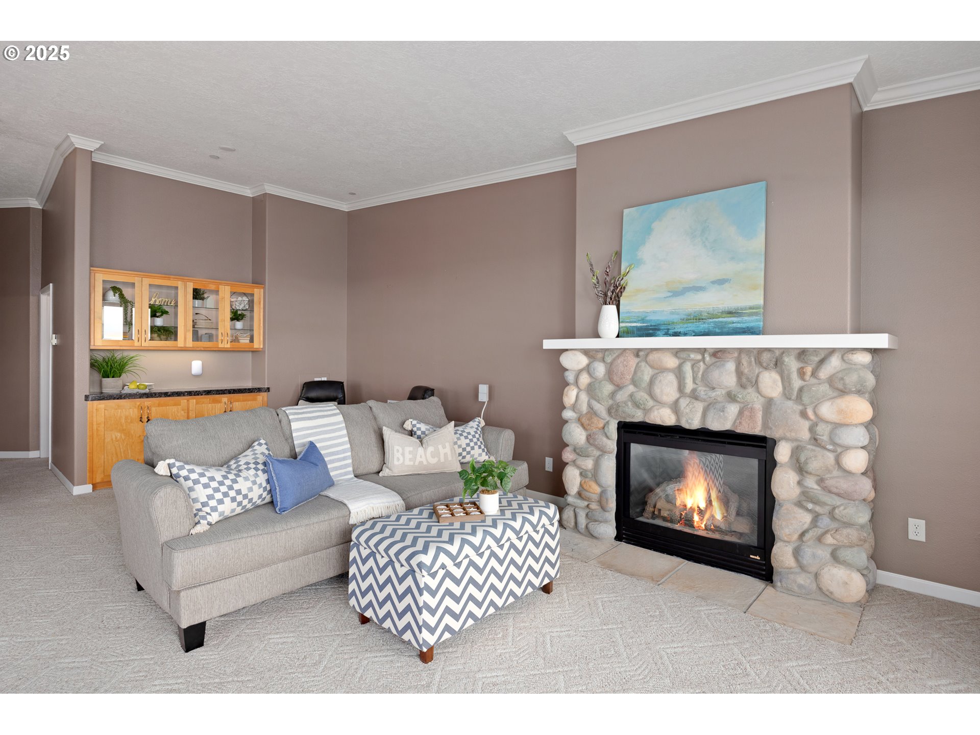 1113 Highway 101, Unit 52 Depoe Bay, OR 97341 - Photo 8 of 47 a living room with furniture and a fireplace