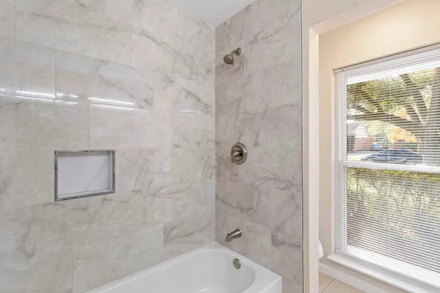 a bathroom with a bathtub