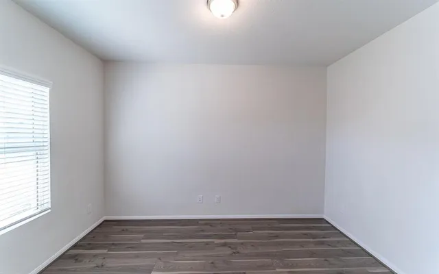 a view of an empty room and window