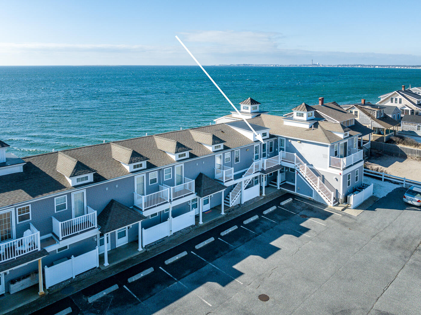 482 Shore Road, Unit 19 Truro, MA 02666 - Photo 14 of 17 a view of a balcony with chairs