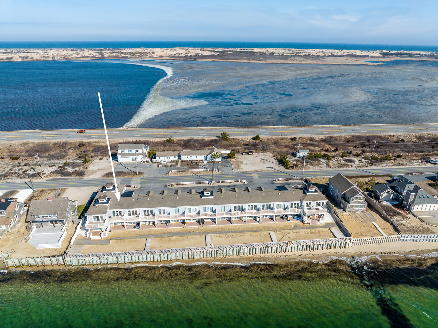 482 Shore Road, Unit 19 Truro, MA 02666 - Photo 16 of 17 a view of a swimming pool with a yard