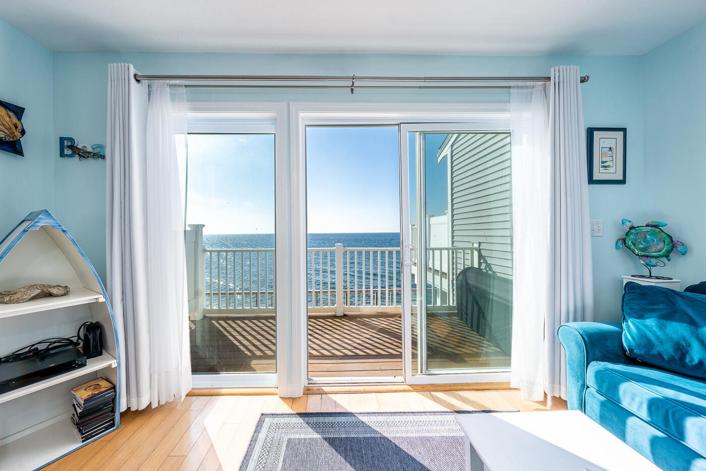 482 Shore Road, Unit 19 Truro, MA 02666 - Photo 6 of 17 a living room with furniture and a window