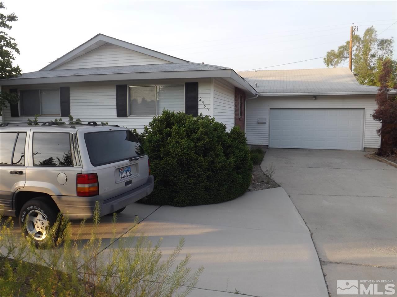 2590 Apollo Way Reno, NV 89503 - Photo 1 of 1 a view of car parked in front of house