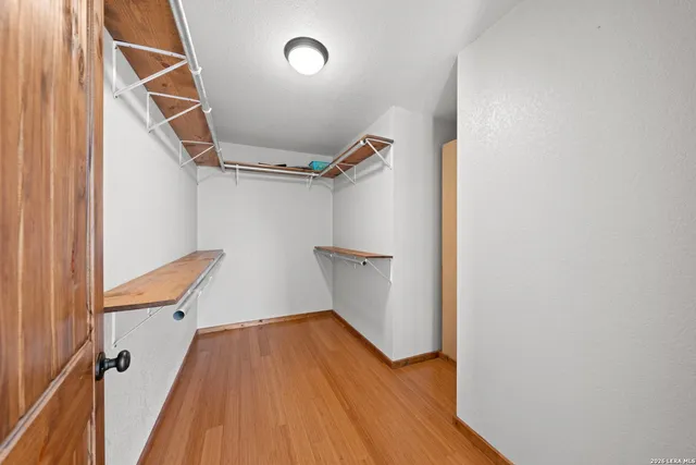 a view of entryway with wooden floor