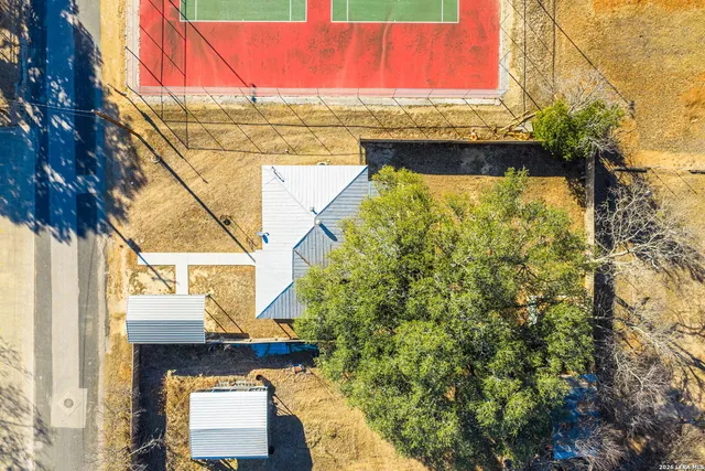 a view of swimming pool with a outdoor seating