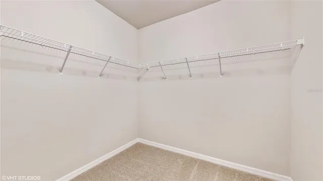 a view of a room with racks on the wall