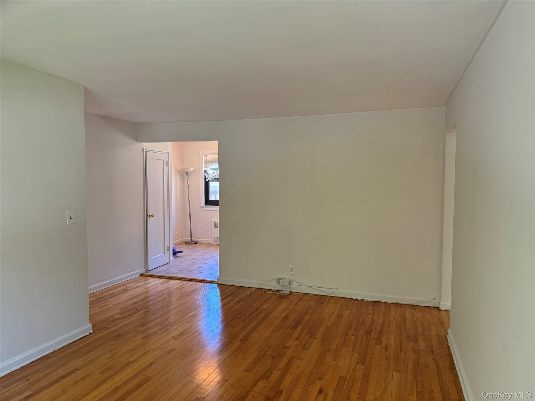 130 Virginia Road, Unit D White Plains, NY 10603 - Photo 5 of 5 Living rook towards dining area and Kitchen