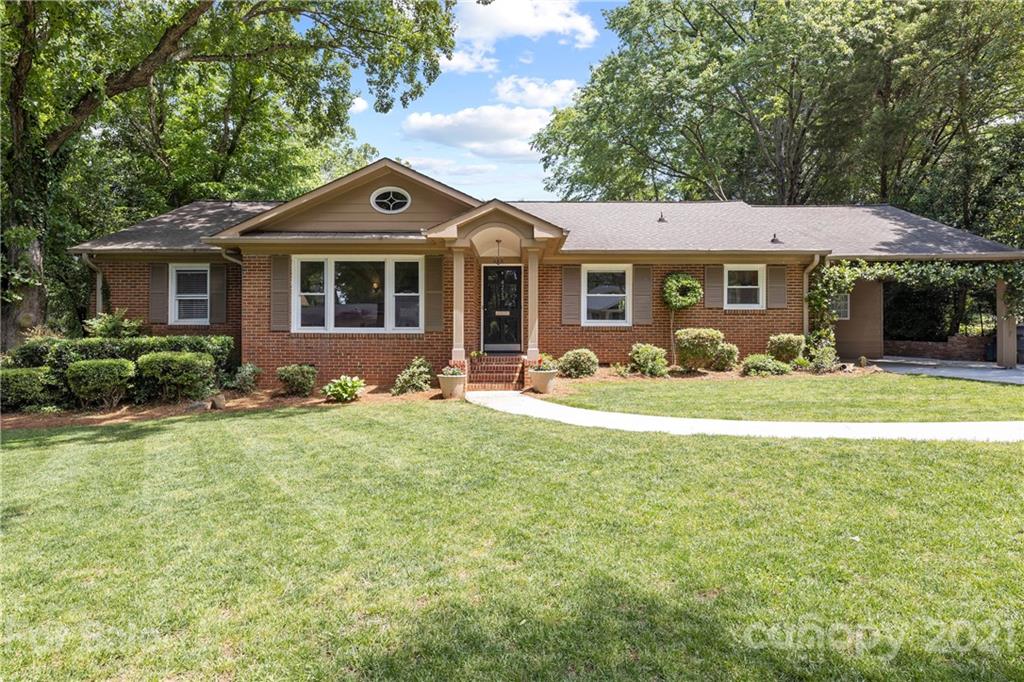 4223 Chelmsford Road Charlotte, NC 28211 - Photo 1 of 33 a front view of house with yard and green space