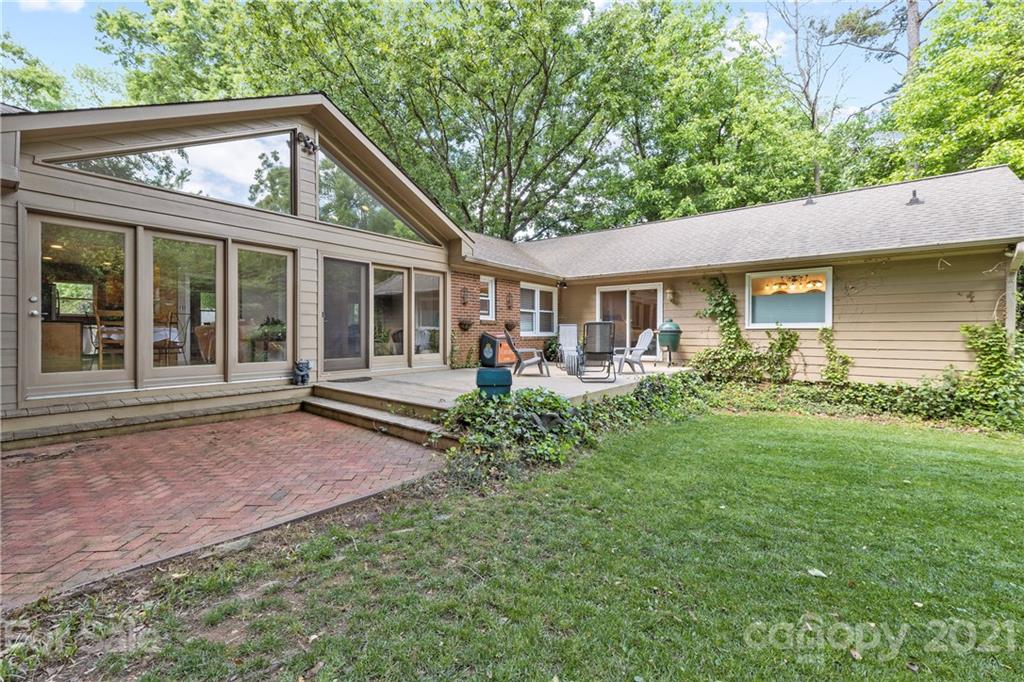 4223 Chelmsford Road Charlotte, NC 28211 - Photo 26 of 33 a view of a house with a backyard