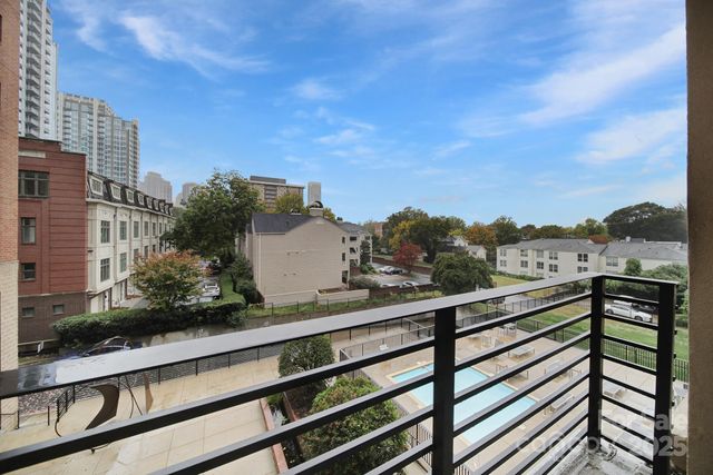 a view of a chairs and table in a patio