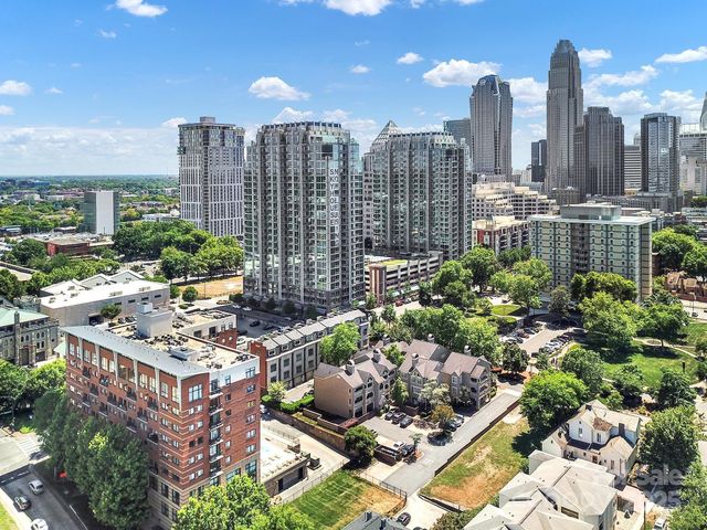 a view of a city with tall buildings