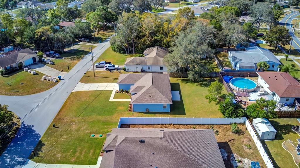 7325 Millstone Street Spring Hill, FL 34606 - Photo 14 of 46 Drone Side View