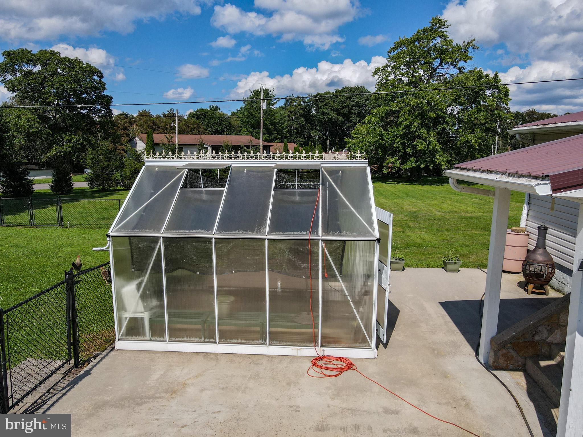 265 Fearer Road Friendsville, MD 21531 - Photo 61 of 75 Charming greenhouse in sunny garden