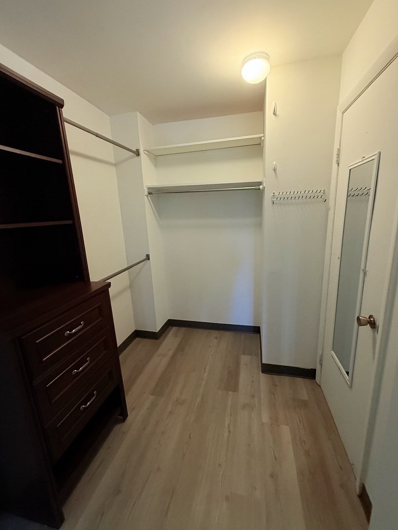 2007 North Sedgwick Street, Unit 202 Chicago, IL 60614 - Photo 8 of 10 wooden floor in an empty room