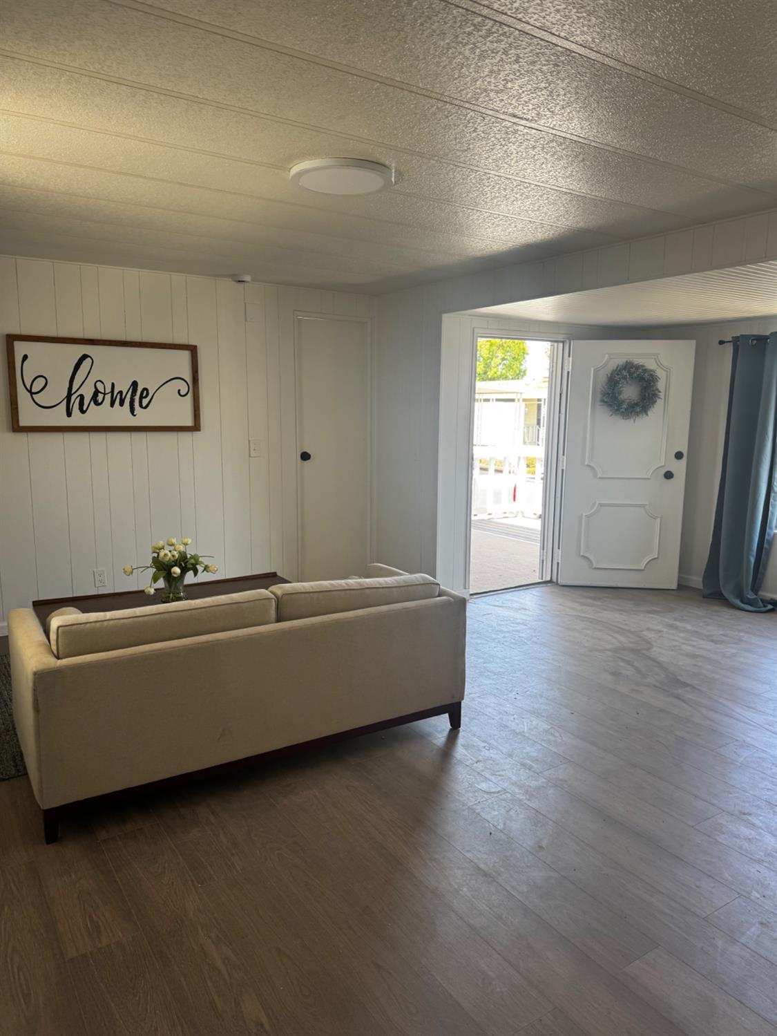 1200 South Carpenter Road, Unit 51 Modesto, CA 95351 - Photo 11 of 20 a living room with hard wood floors and a window