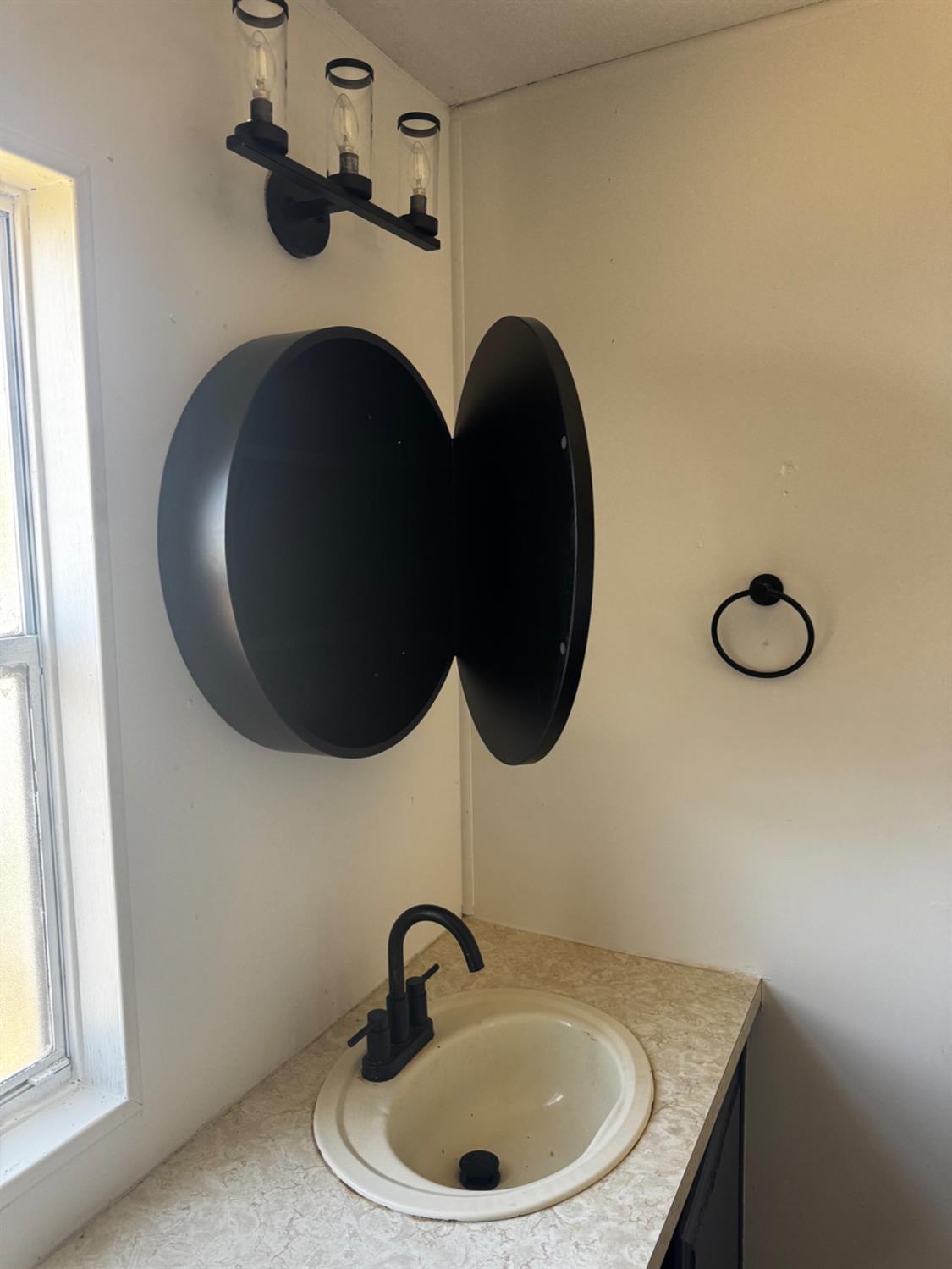 1200 South Carpenter Road, Unit 51 Modesto, CA 95351 - Photo 18 of 20 a close view of sink and tap