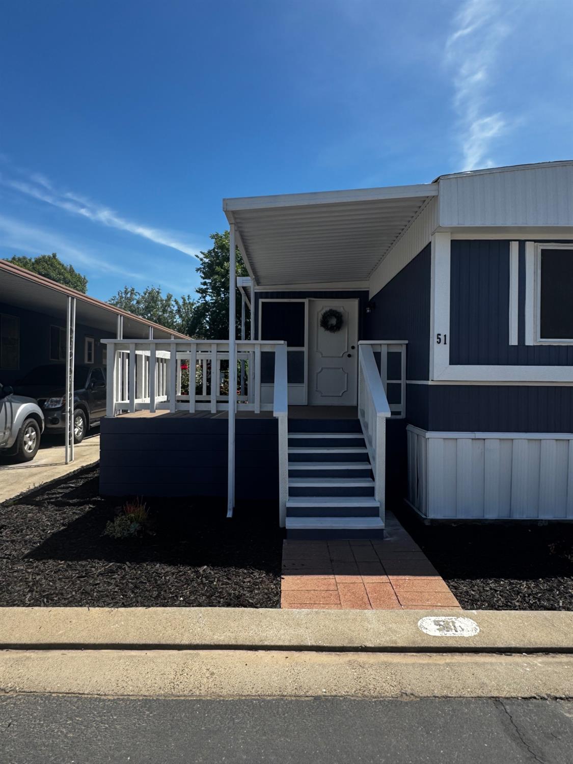 1200 South Carpenter Road, Unit 51 Modesto, CA 95351 - Photo 3 of 20 a view of a house with a deck