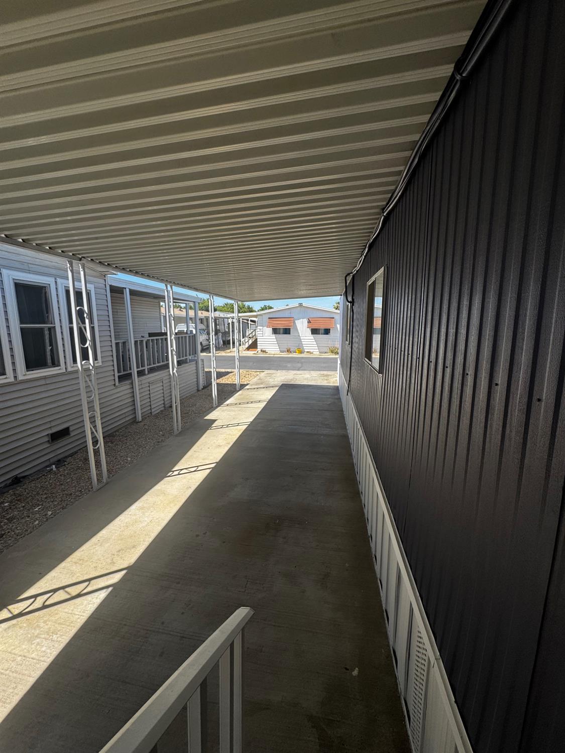 1200 South Carpenter Road, Unit 51 Modesto, CA 95351 - Photo 5 of 20 a view of a house with a balcony