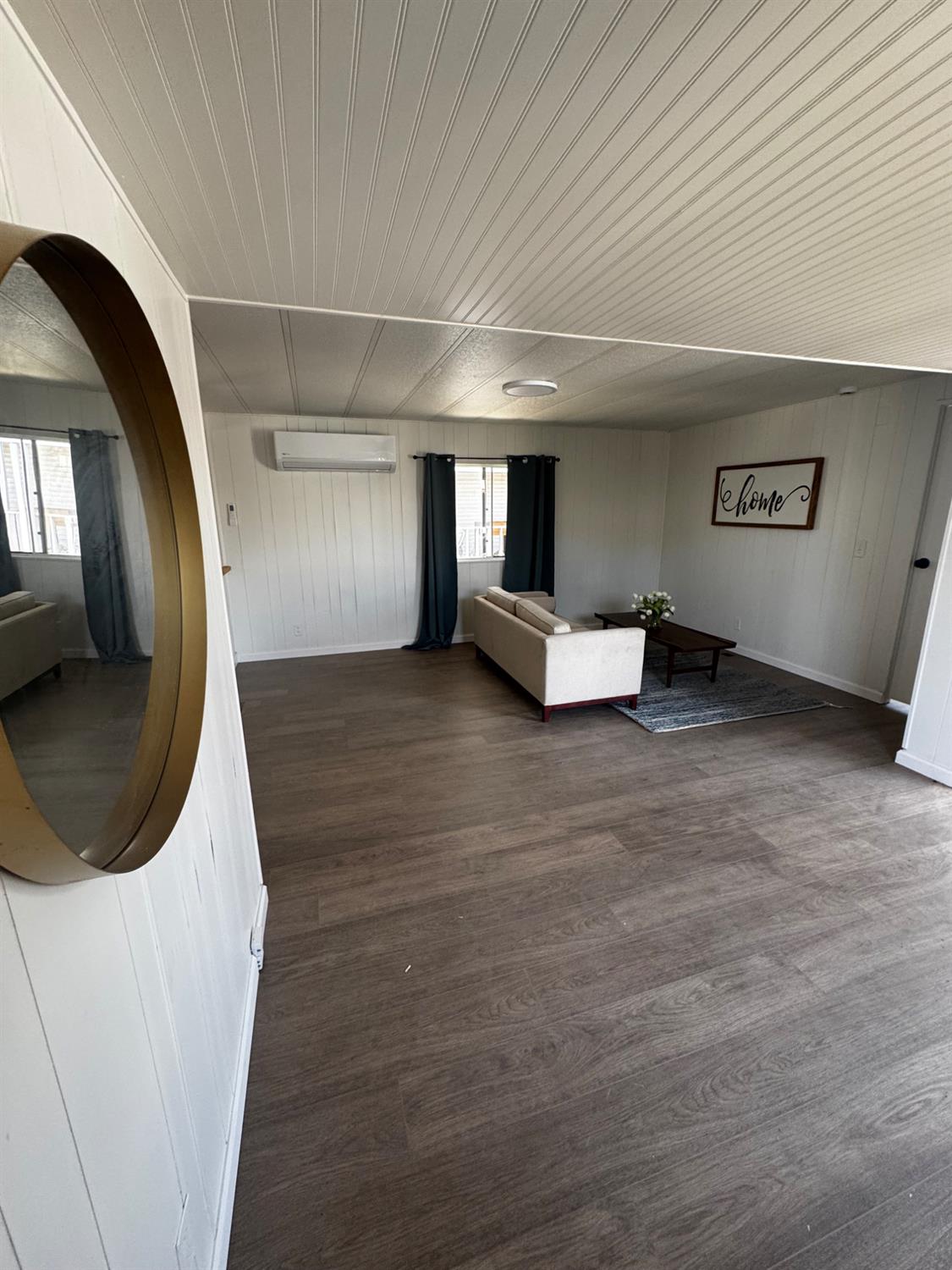 1200 South Carpenter Road, Unit 51 Modesto, CA 95351 - Photo 7 of 20 a view of a livingroom with furniture and staircase