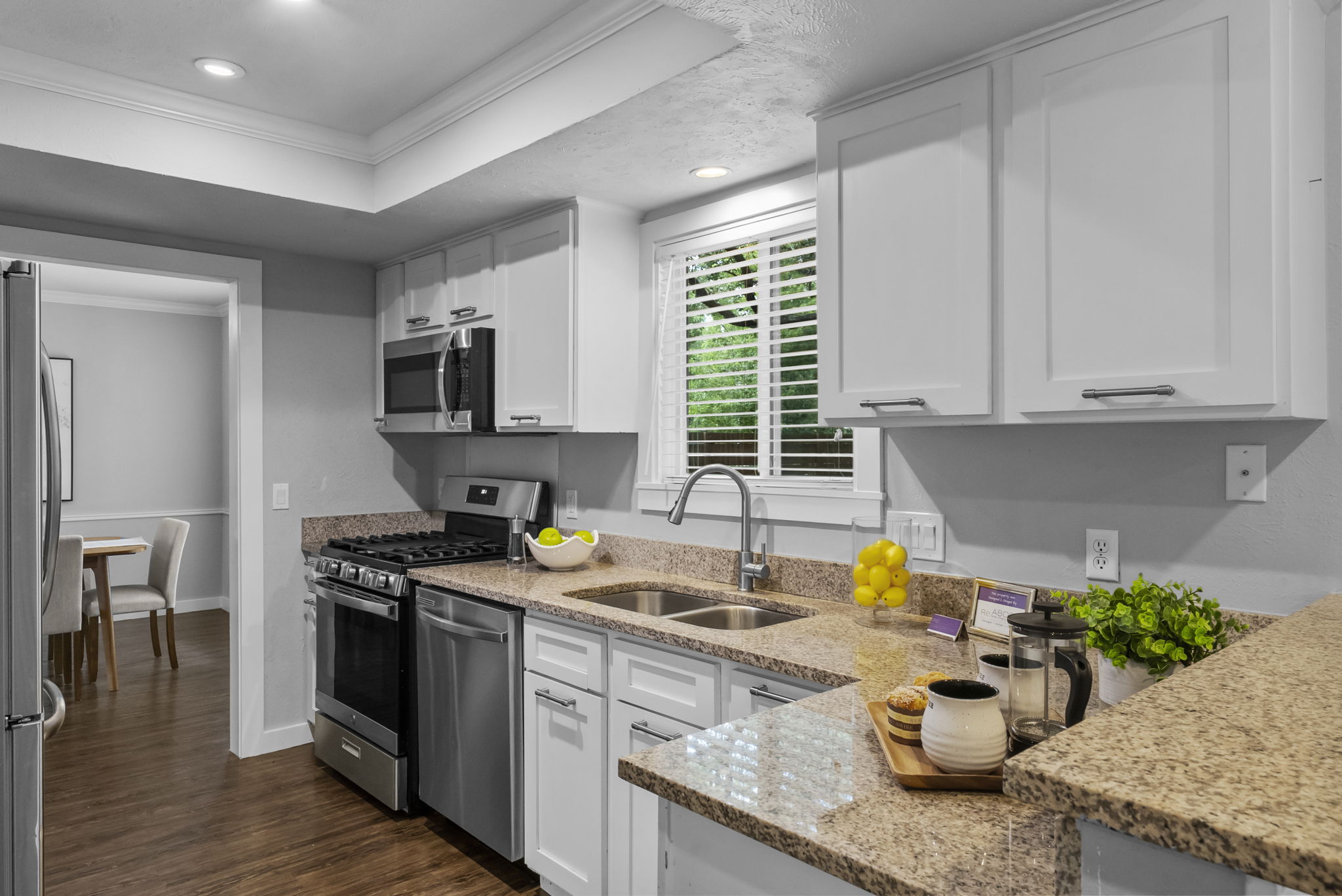 11405 Pyreneese Drive Austin, TX 78759 - Photo 6 of 37 a kitchen with sink cabinets and appliances