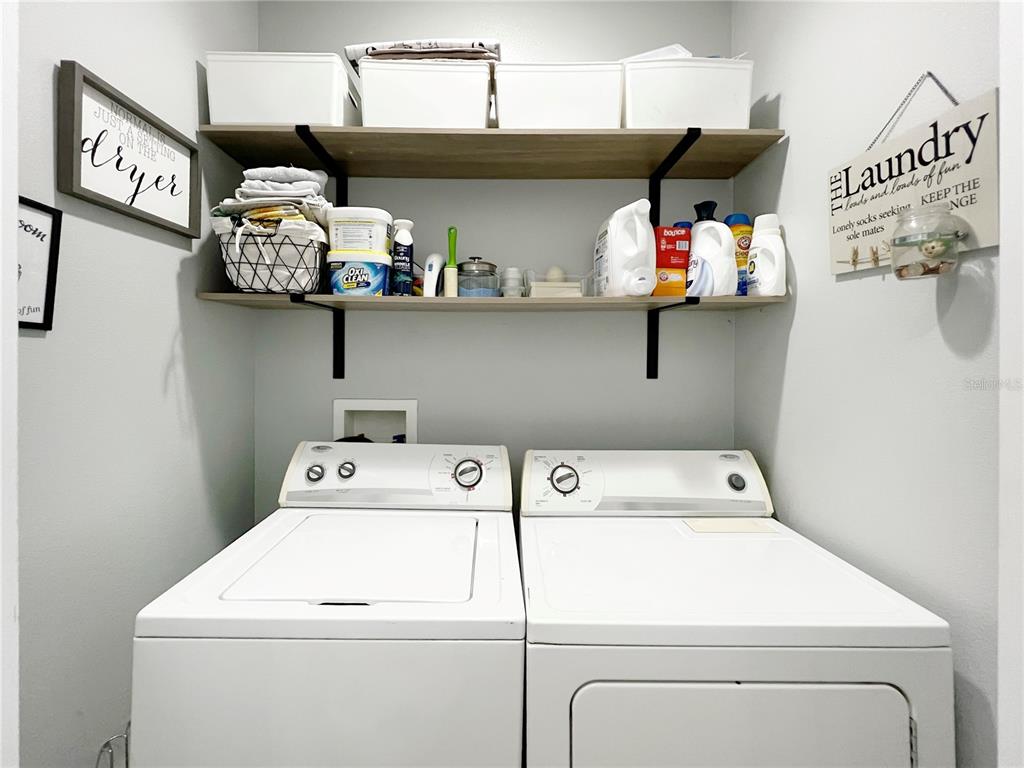 15767 Stable Run Drive Spring Hill, FL 34610 - Photo 30 of 34 a utility room with dryer and washer