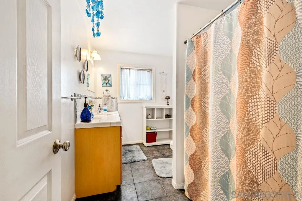 3489 Lakeview Drive Spring Valley, CA 91977 - Photo 12 of 50 a room that has a bed and a dresser in it