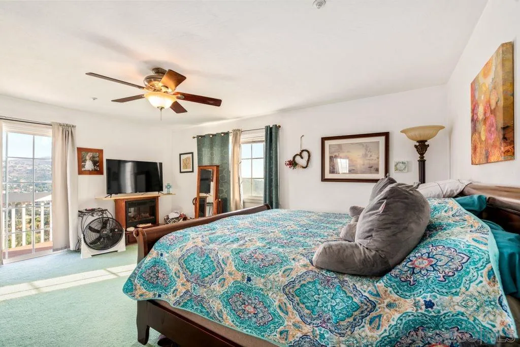 3489 Lakeview Drive Spring Valley, CA 91977 - Photo 16 of 50 a bedroom with a bed window and couch