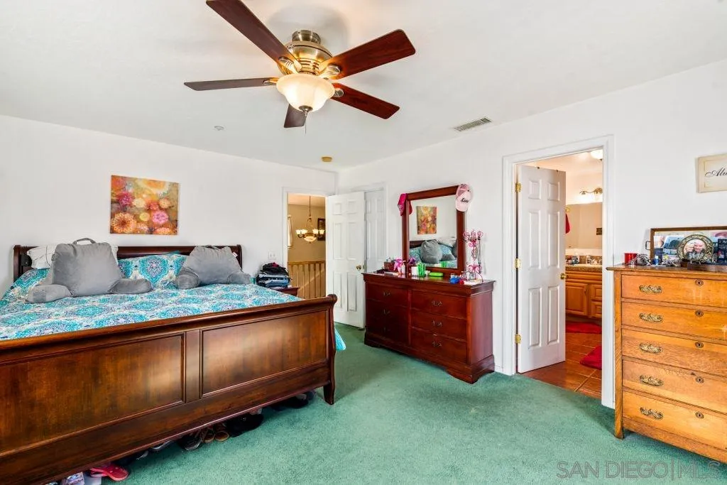3489 Lakeview Drive Spring Valley, CA 91977 - Photo 17 of 50 a bed room with a bed and a dresser