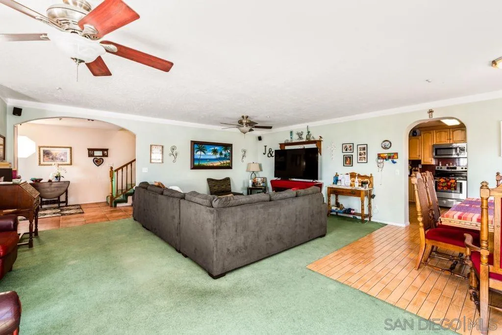3489 Lakeview Drive Spring Valley, CA 91977 - Photo 23 of 50 a living room with furniture and a flat screen tv