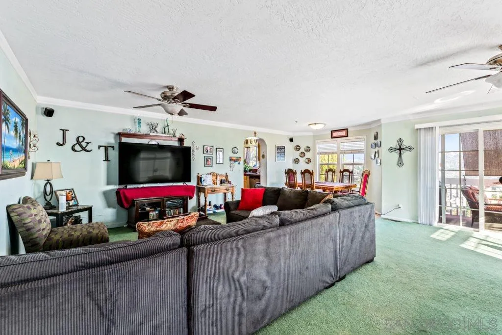 3489 Lakeview Drive Spring Valley, CA 91977 - Photo 24 of 50 a living room with furniture and a flat screen tv