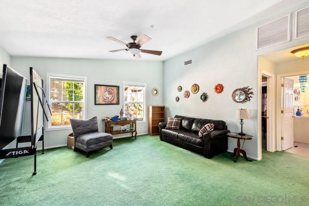 3489 Lakeview Drive Spring Valley, CA 91977 - Photo 9 of 50 a living room with furniture and a flat screen tv