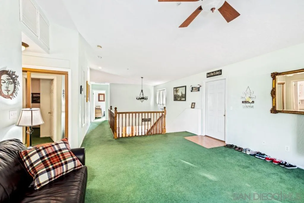 3489 Lakeview Drive Spring Valley, CA 91977 - Photo 10 of 50 a bedroom with a bed and wooden floor