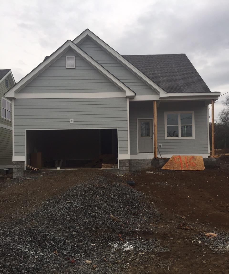 916 Pierce Road Madison, TN 37115 - Photo 1 of 1 a front view of a house with a yard