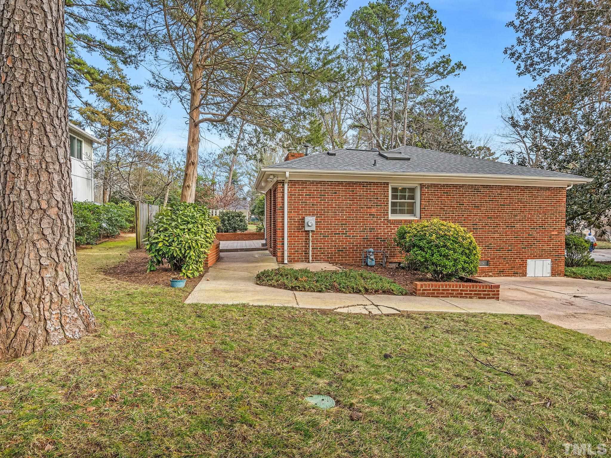 1509 Windbur Place Raleigh, NC 27609 - Photo 38 of 39 front view of a house with a yard