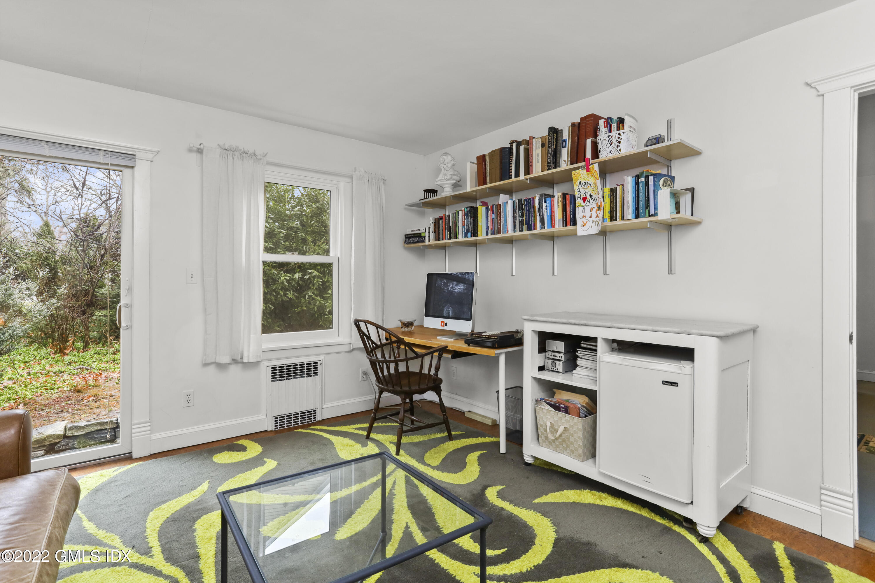 17 Summit Road Riverside, CT 06878 - Photo 8 of 25 a work room with furniture and a book shelf