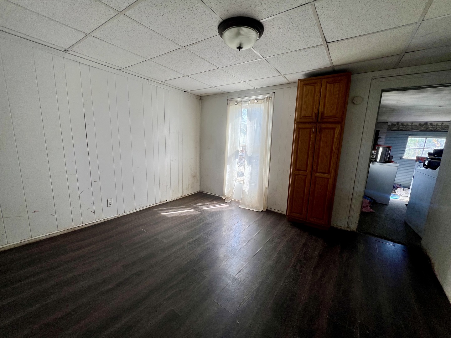 110 South Vermilion Street Potomac, IL 61865 - Photo 17 of 24 a view of livingroom with furniture wooden floor and window