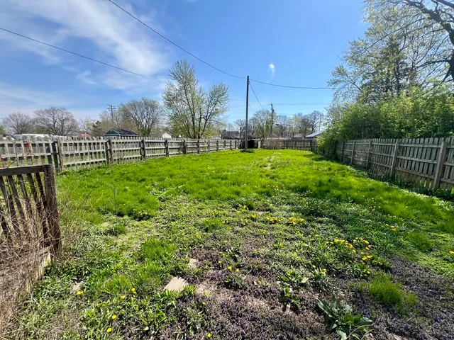a house view with a garden space