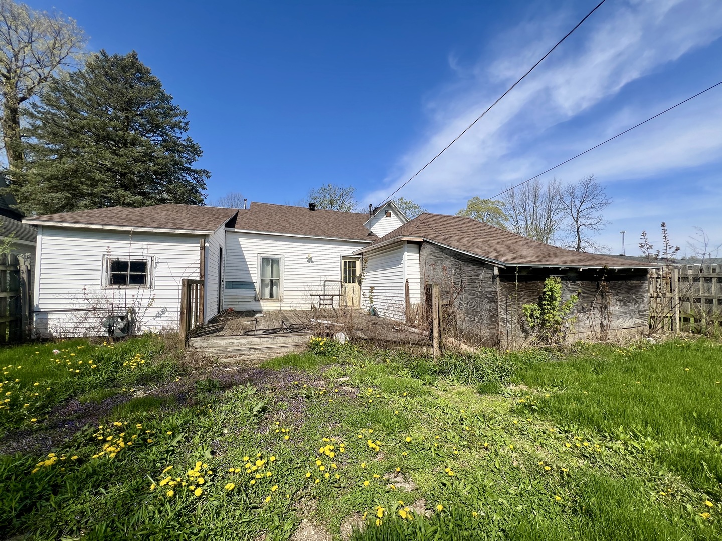 110 South Vermilion Street Potomac, IL 61865 - Photo 23 of 24 a house view with a garden space