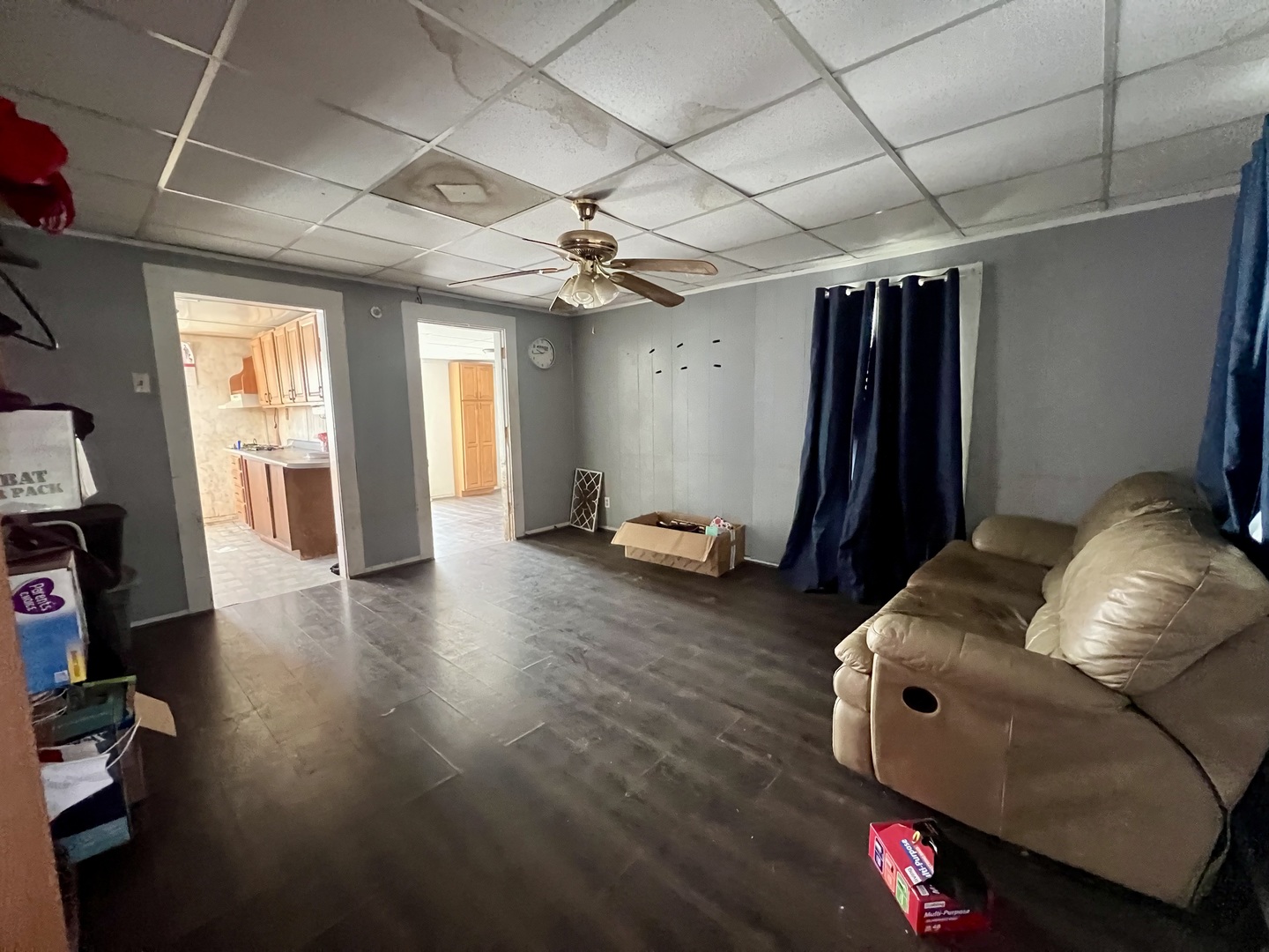 110 South Vermilion Street Potomac, IL 61865 - Photo 8 of 24 a living room with furniture and a flat screen tv