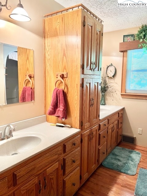 191 Welch Road Lansing, NC 28643 - Photo 22 of 41 a view of walk in closet with clothes and shoes