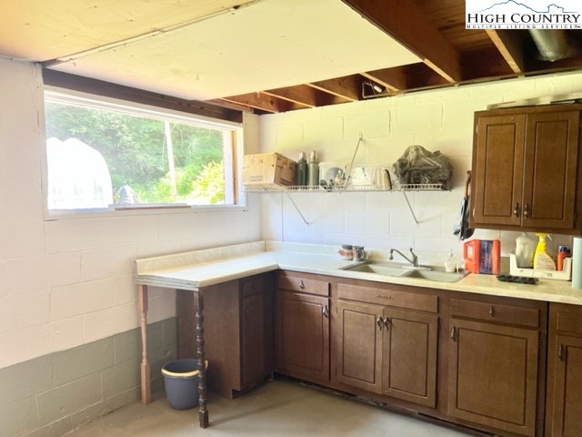 191 Welch Road Lansing, NC 28643 - Photo 24 of 41 a kitchen with a sink and a window