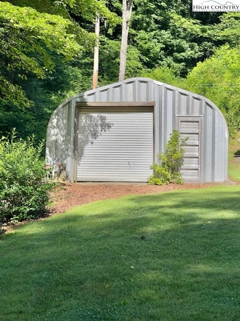 191 Welch Road Lansing, NC 28643 - Photo 3 of 41 a view of a back yard